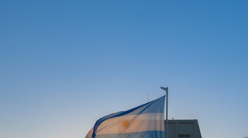 argentina flag near building under blue sky
